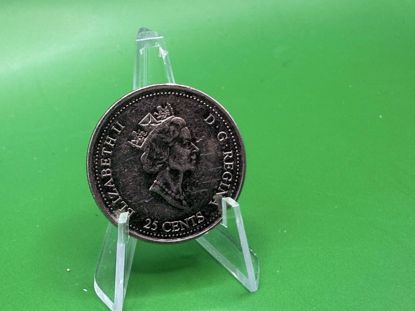 صورة عمله كنديه اليزابيث الوجه الاخر رجل وطفل 