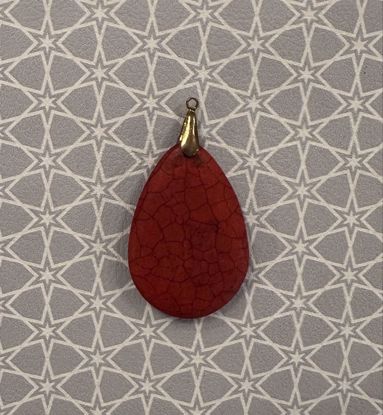 صورة ميدالية حجر اليشم الأحمر (jade stone)